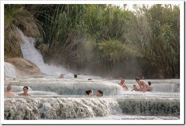 Taking the waters at Saturnia, with its massive hot waterfall.